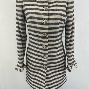 Unique jacket, size 4, 28” long. Great condition